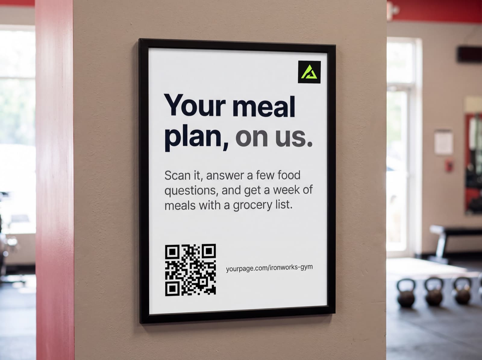 A branded meal plan poster hanging on a gym wall by the entrance